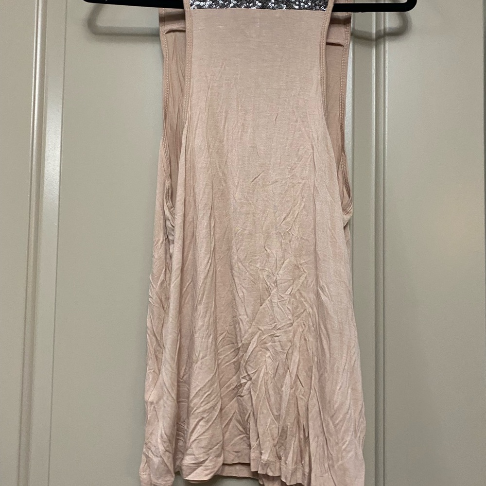 Size medium tank , never worn ,